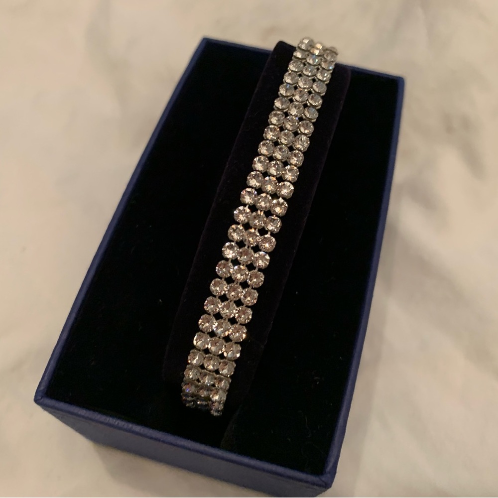 Swarovski triple strand “diamond style tennis bracelet”.  Perfect gift!